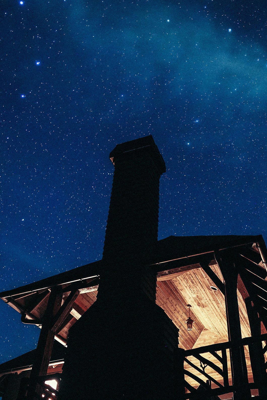 chimney shown at night with stars in background